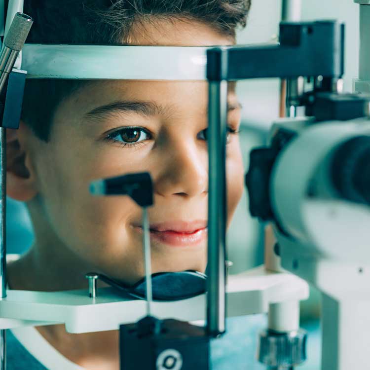 Photo of a child receiving an eye exam