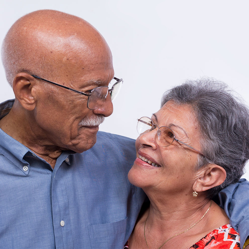 Older couple smiling at each other