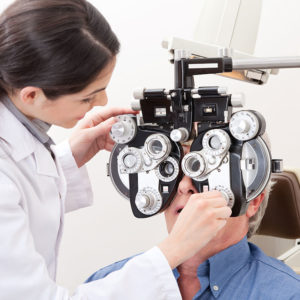 female eye doctor with patient