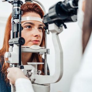 Woman receiving an eye exam